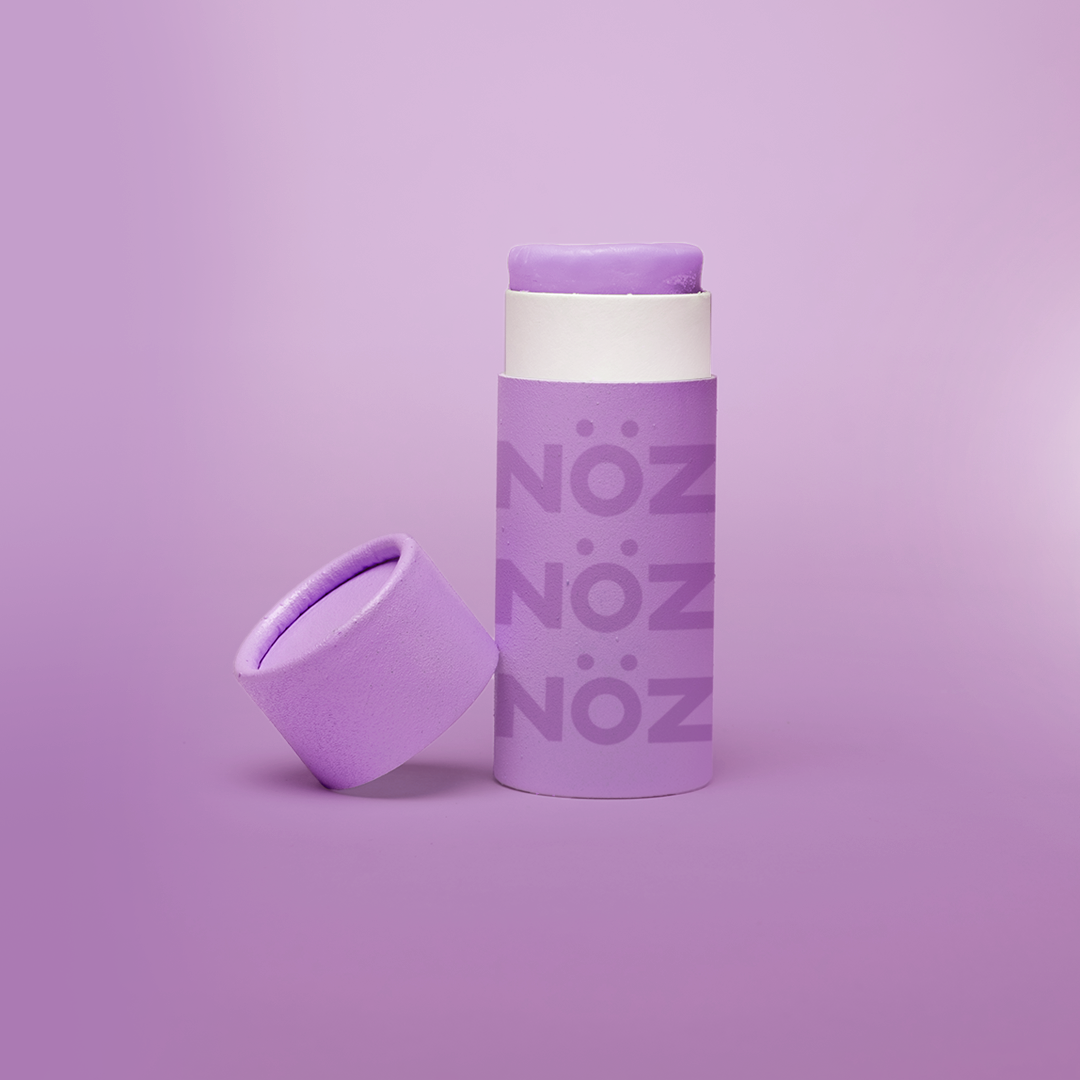 Purple Haze colored Nöz Sunscreen in stick applicator form, available in SPF 30, 50, and 70. Reef safe, eco-friendly, and fun!